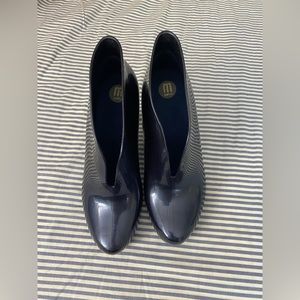 Dark blue, almost new.